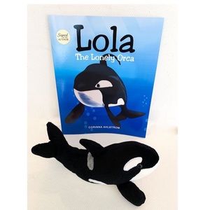 Author signed paperback book with stuffed orca